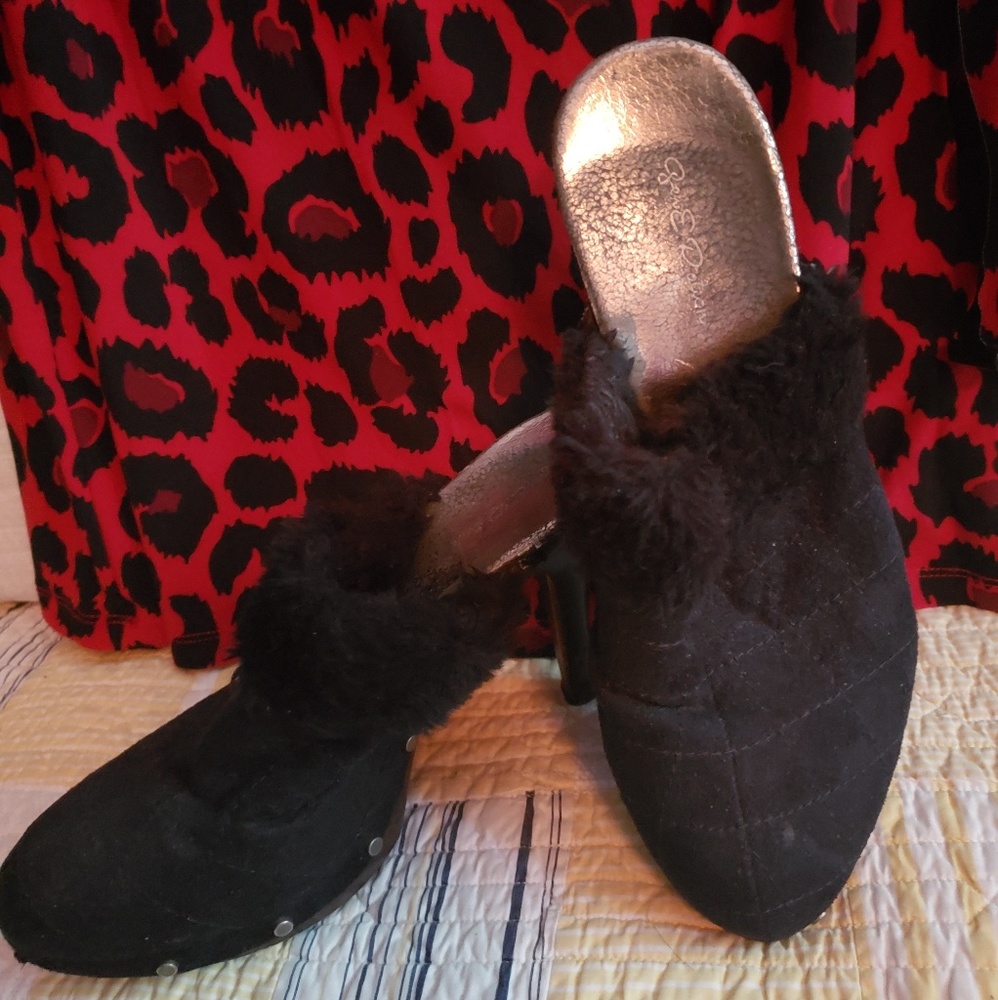 Slip on, high heeled boot, size 8.5